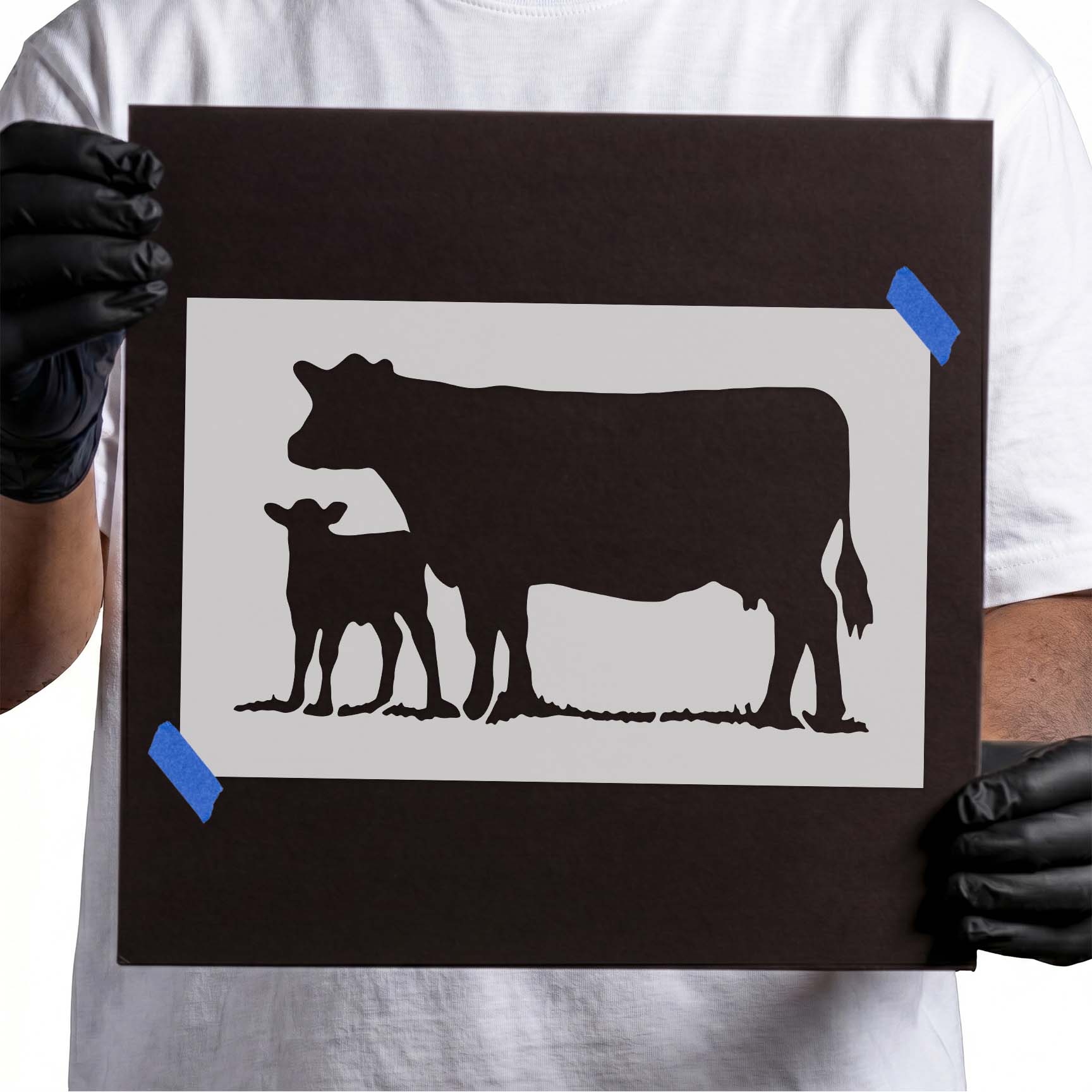 Cow and calf silhouette stencil standing together in profile
