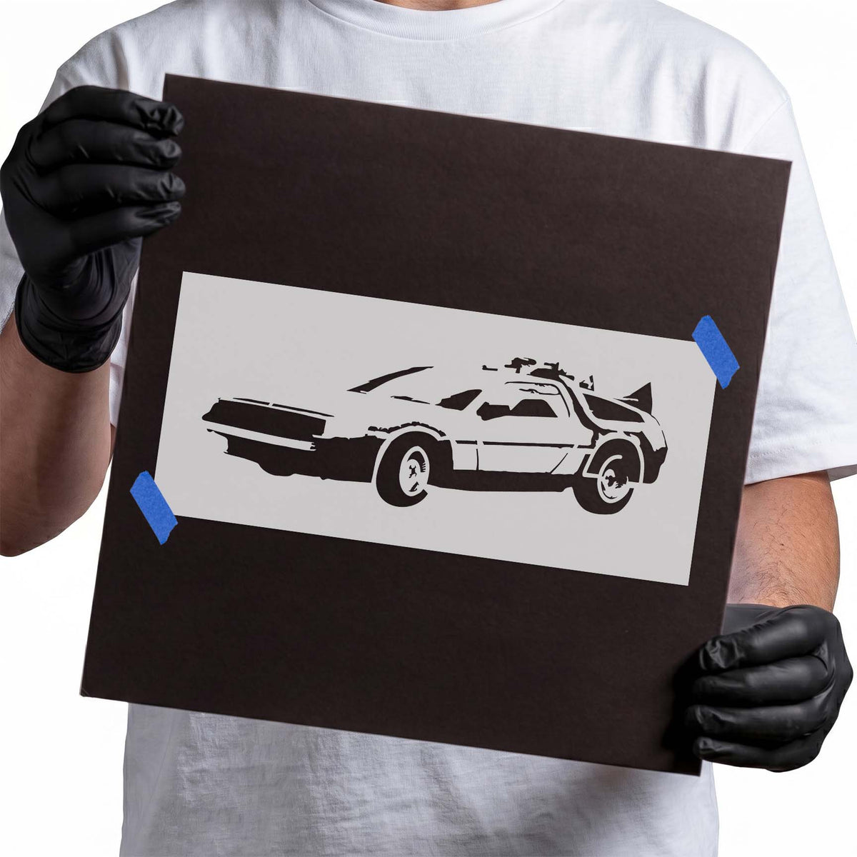 Angular Delorean car stencil with detailed wheels and retro profile