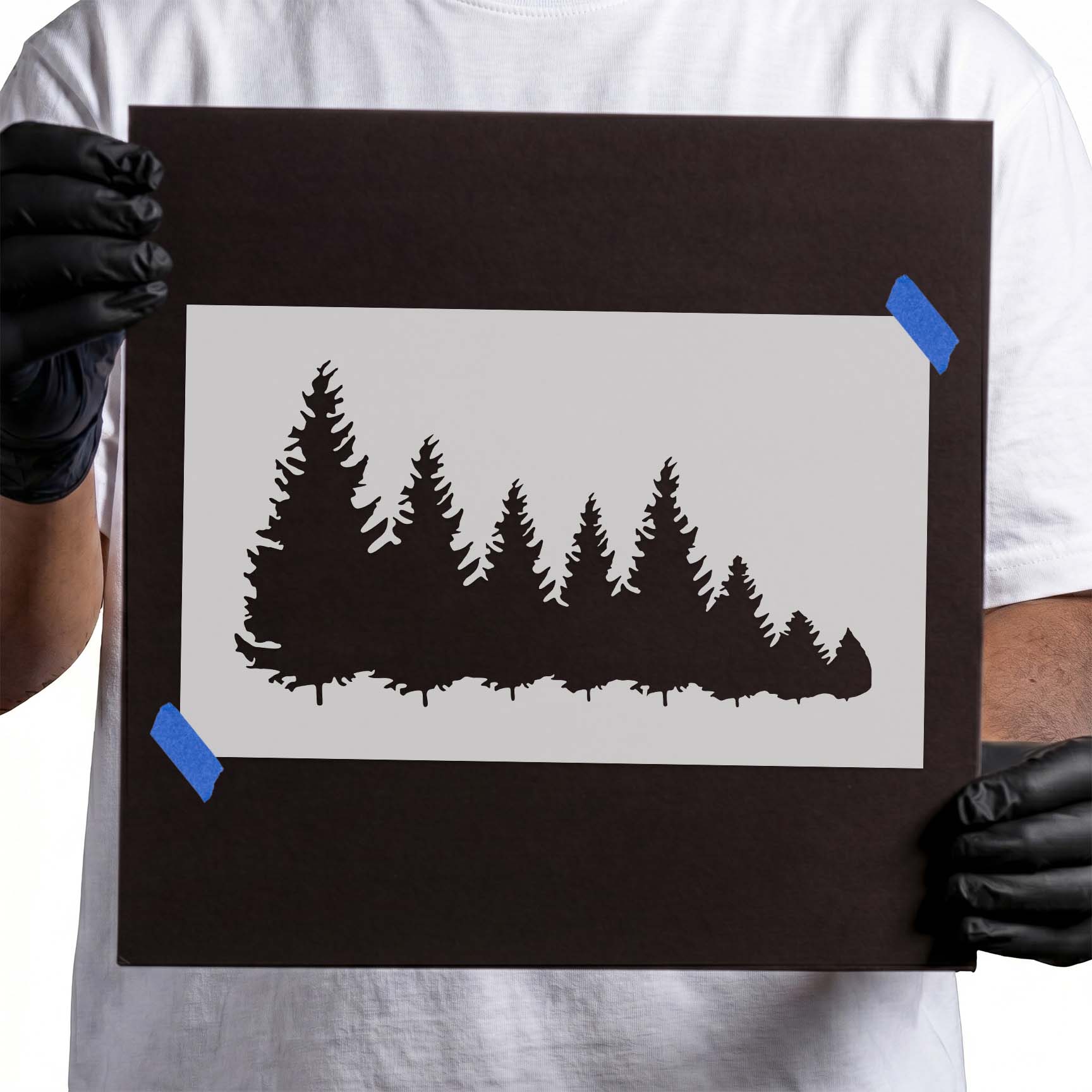 Stencil of descending evergreen pine tree silhouettes