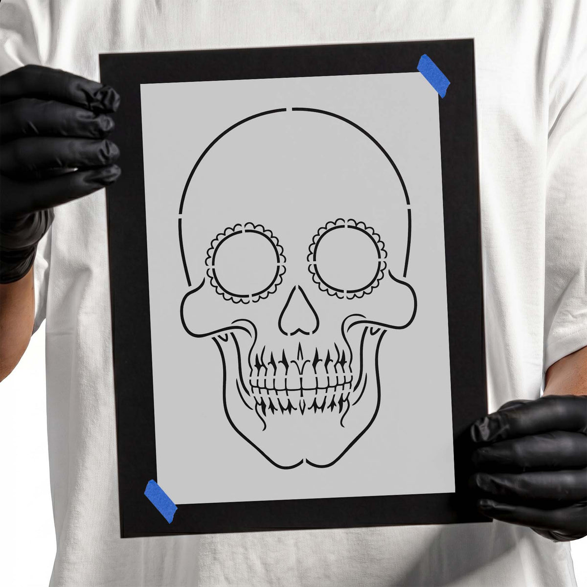 Dia de los Muertos skull stencil with scalloped circular eyes