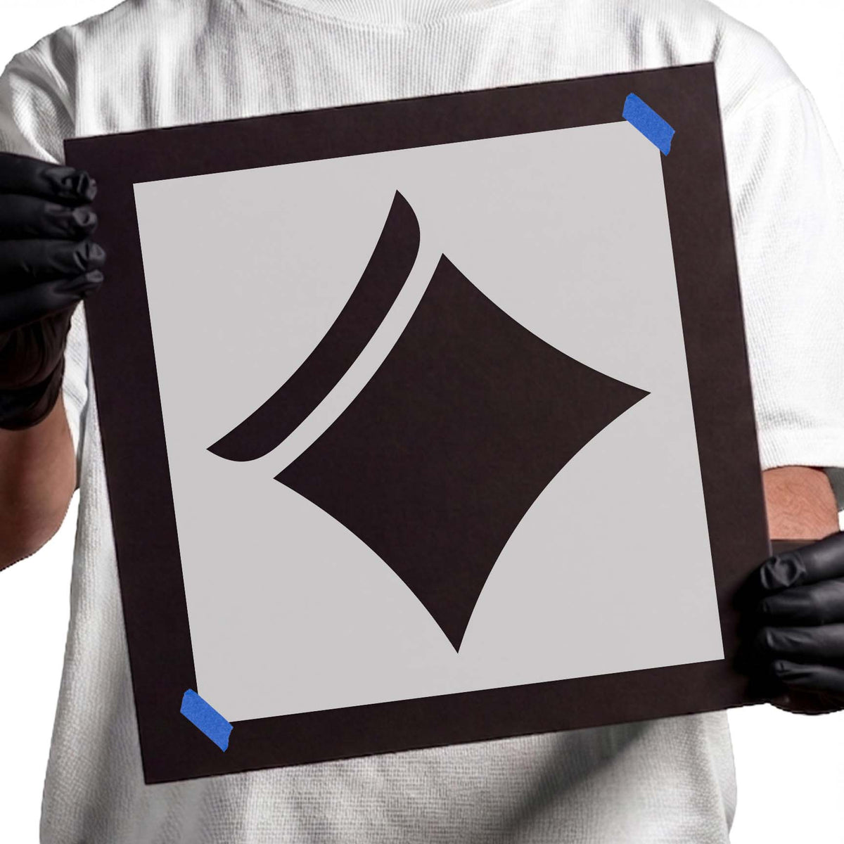Diamond casino symbol stencil with bold geometric shape and curved accent