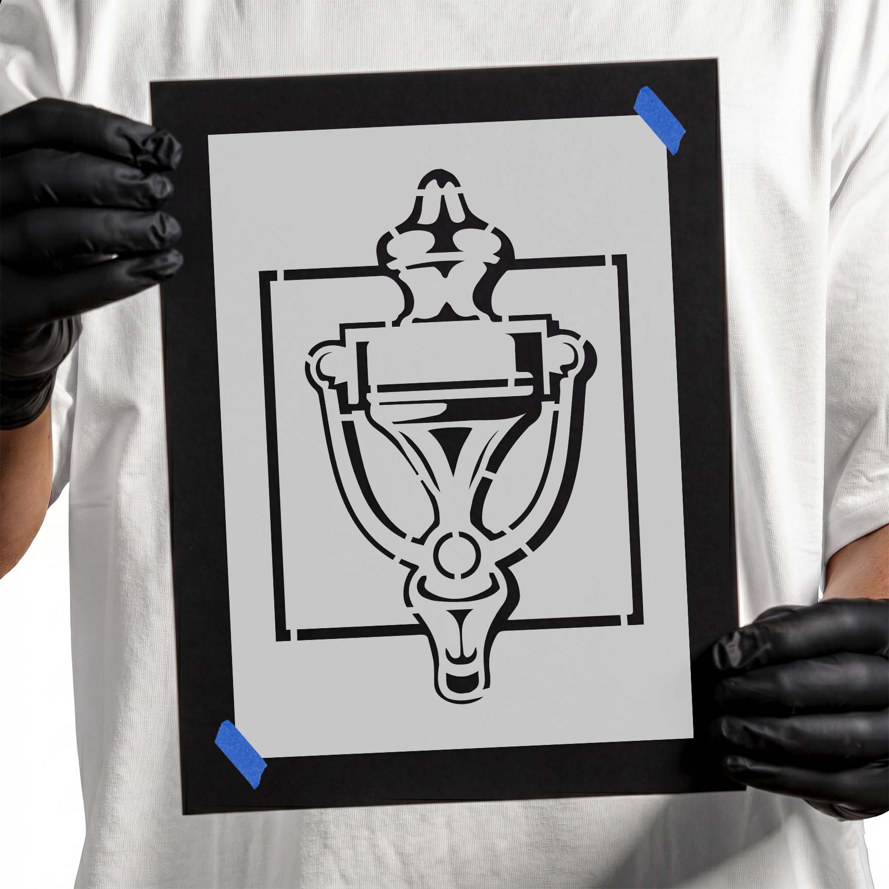 Decorative door knocker stencil with symmetrical outlined details
