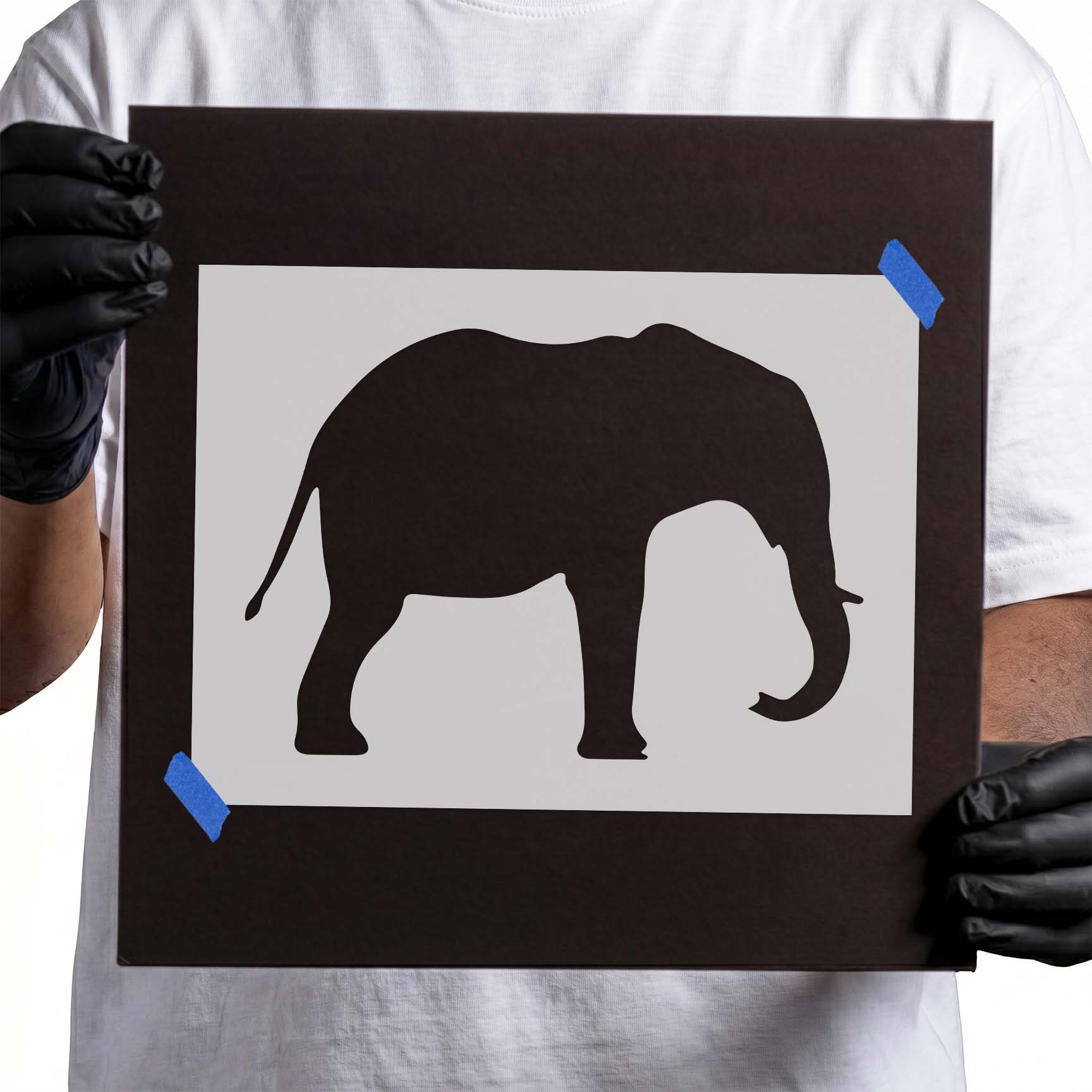 Elephant silhouette stencil with lowered curved trunk and slender tail
