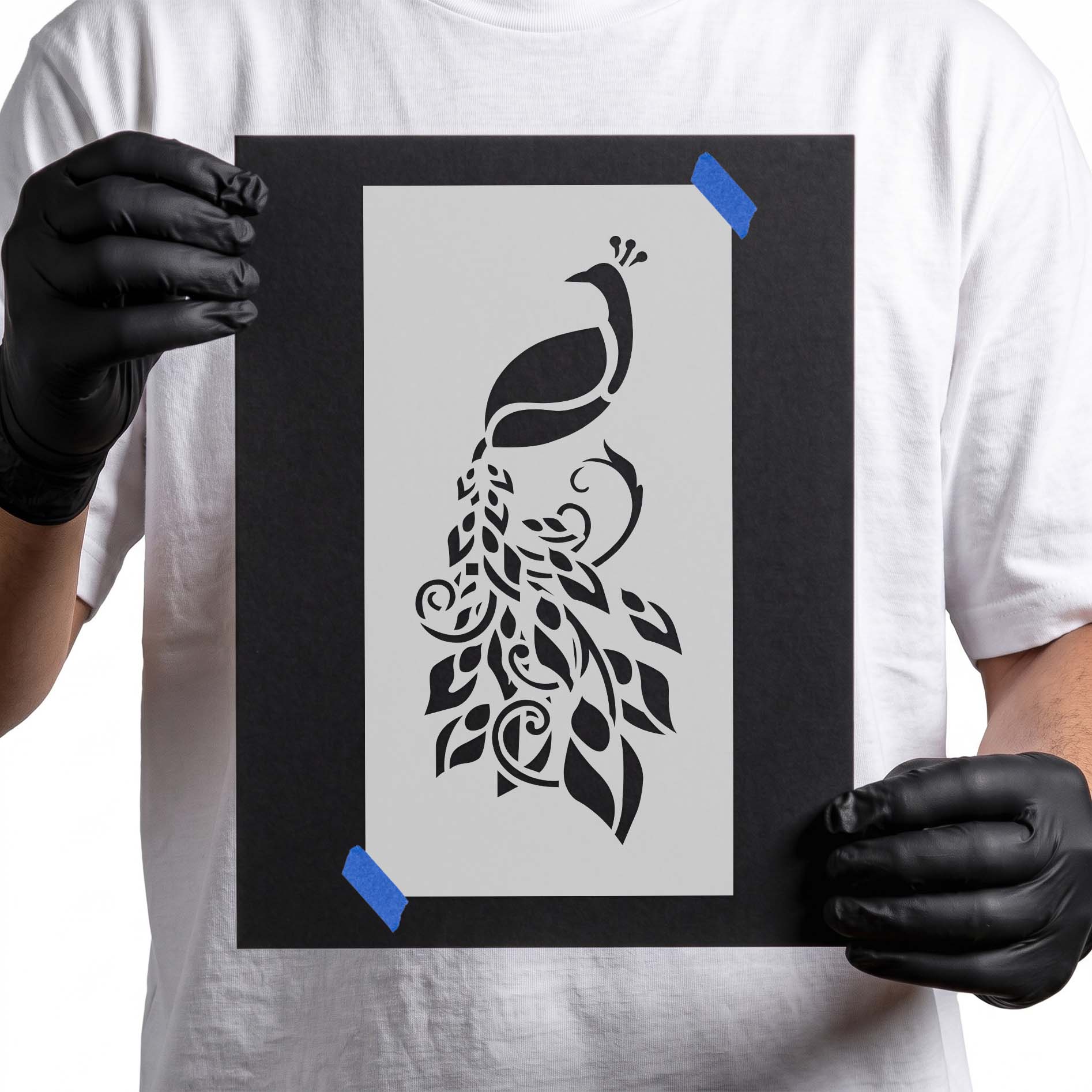 Decorative peacock stencil with flowing ornamental feather and leaf details