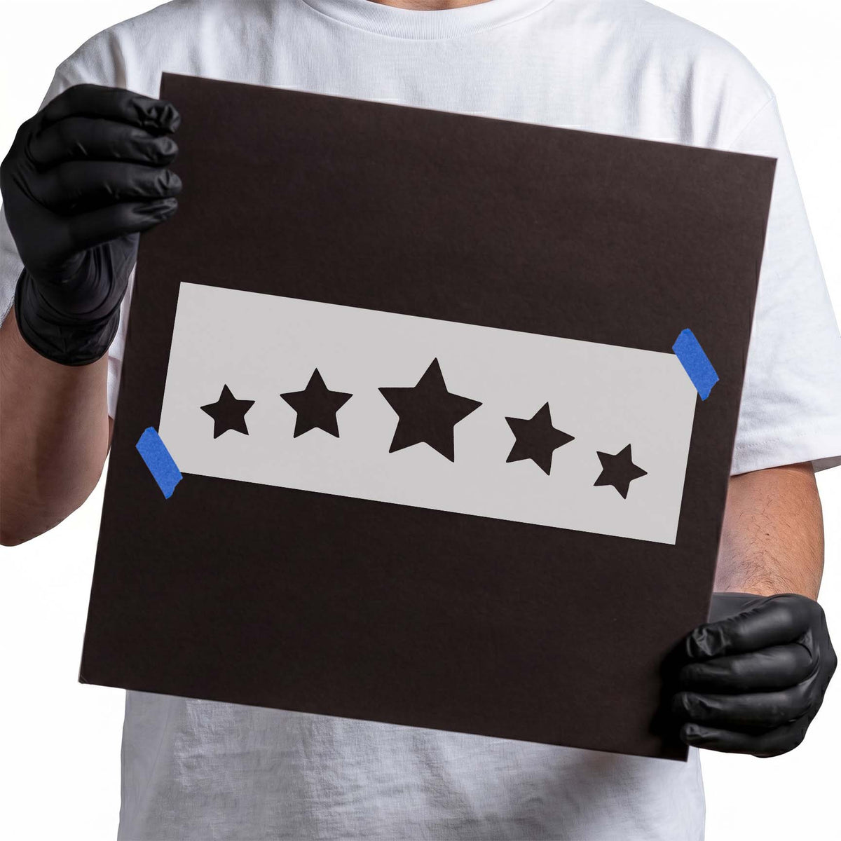 Five star stencil with varied sizes arranged in a horizontal row