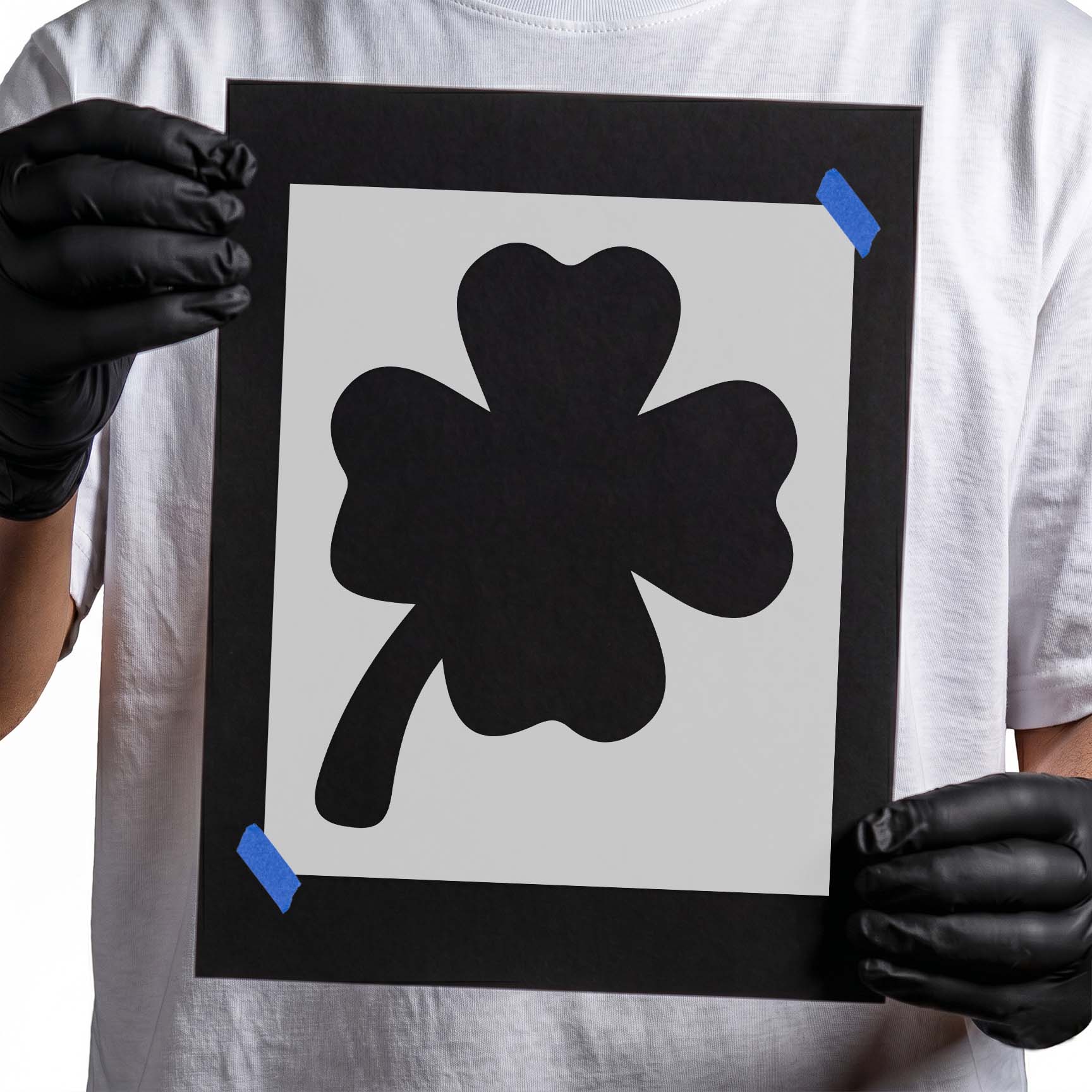Four leaf clover stencil with rounded leaves and curved stem
