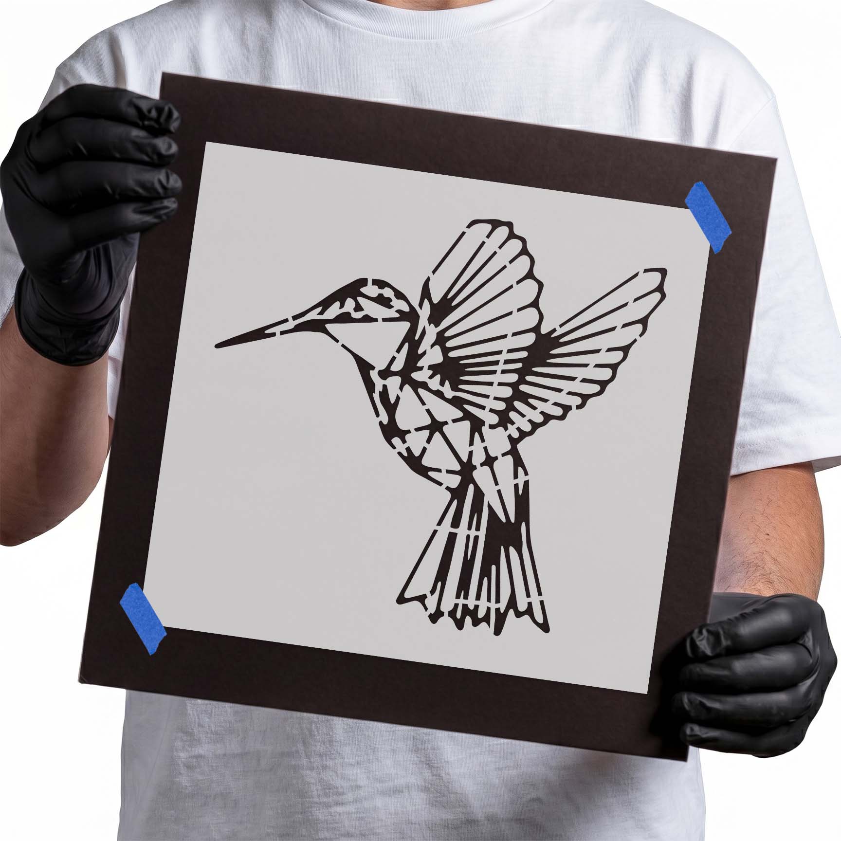 Geometric hummingbird stencil with spread wings and long pointed beak