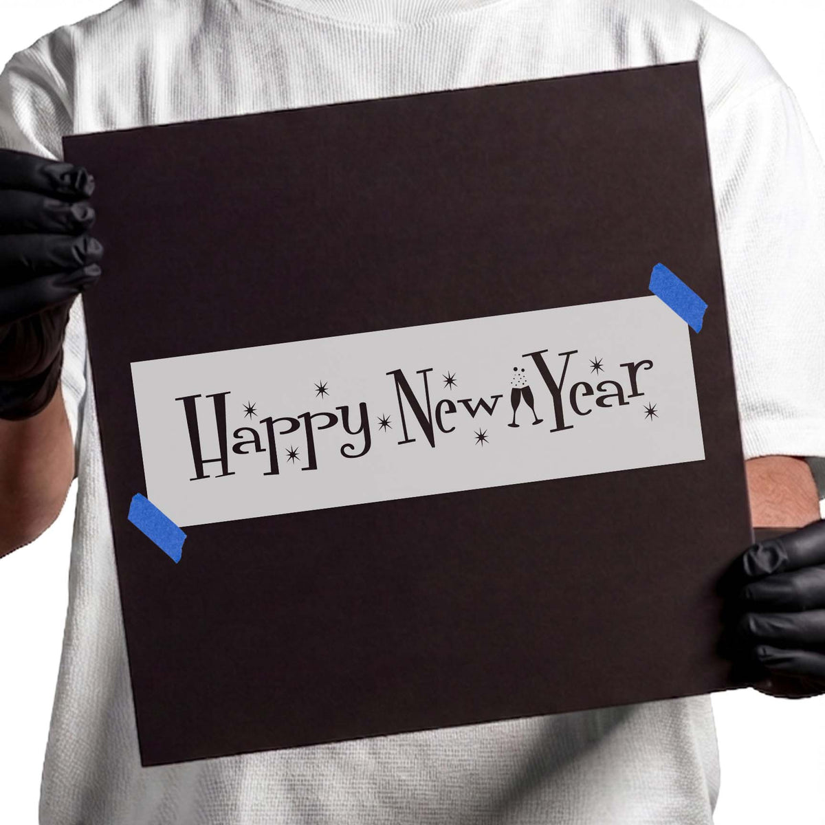 Happy New Year stencil with champagne glasses and sparkling stars