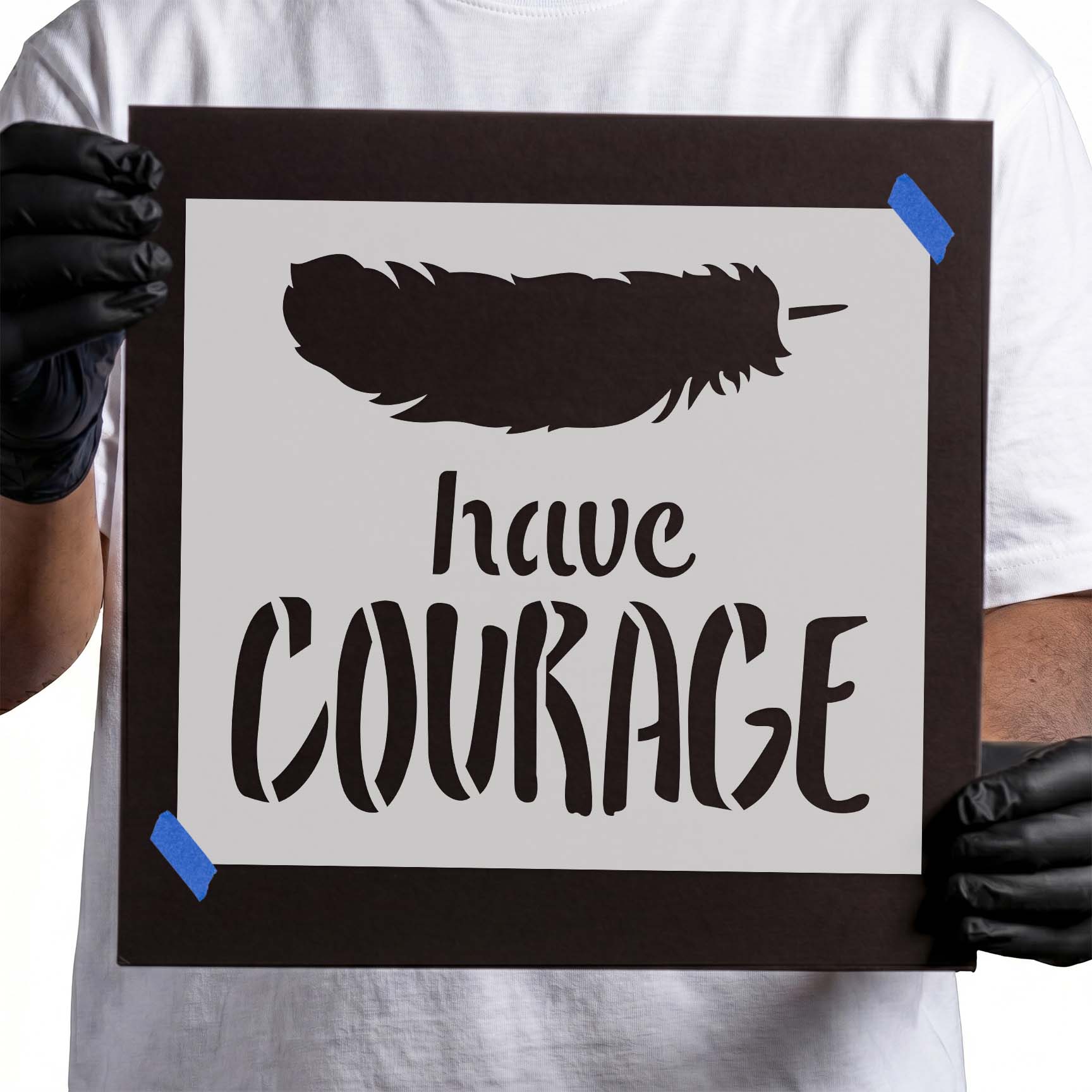 Have courage stencil lettering beneath a large feather silhouette