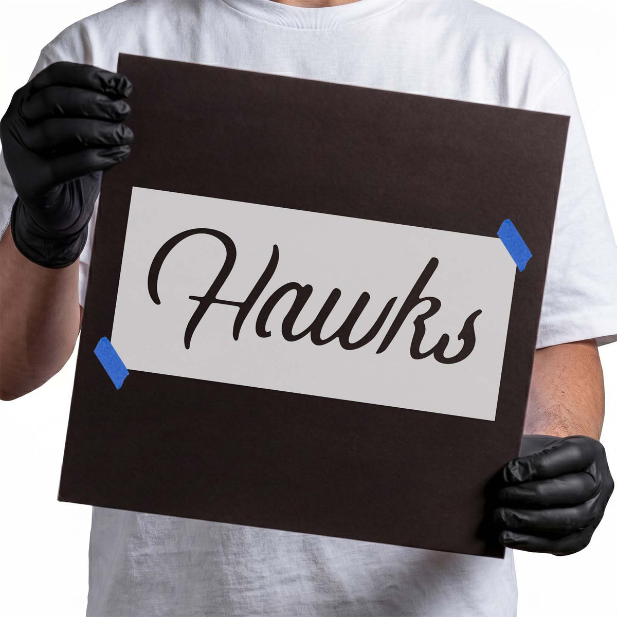 Hawks stencil in cursive script lettering