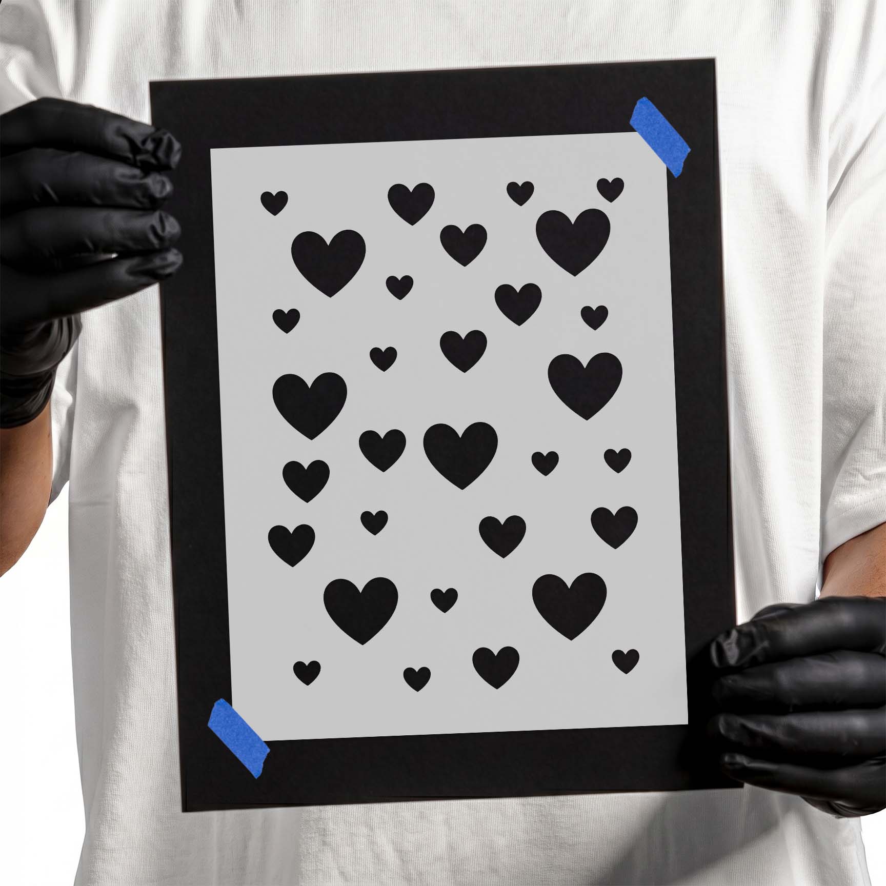 Scattered heart stencil pattern with assorted small and large hearts