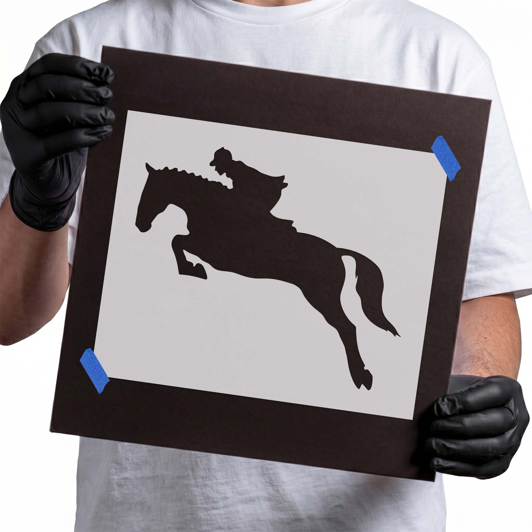 Jumping horse stencil with rider leaning forward in midair