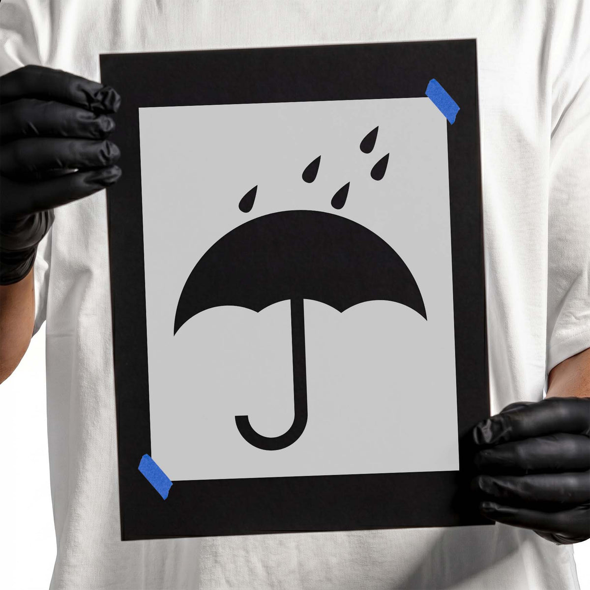 Keep dry icon stencil featuring umbrella and five raindrops