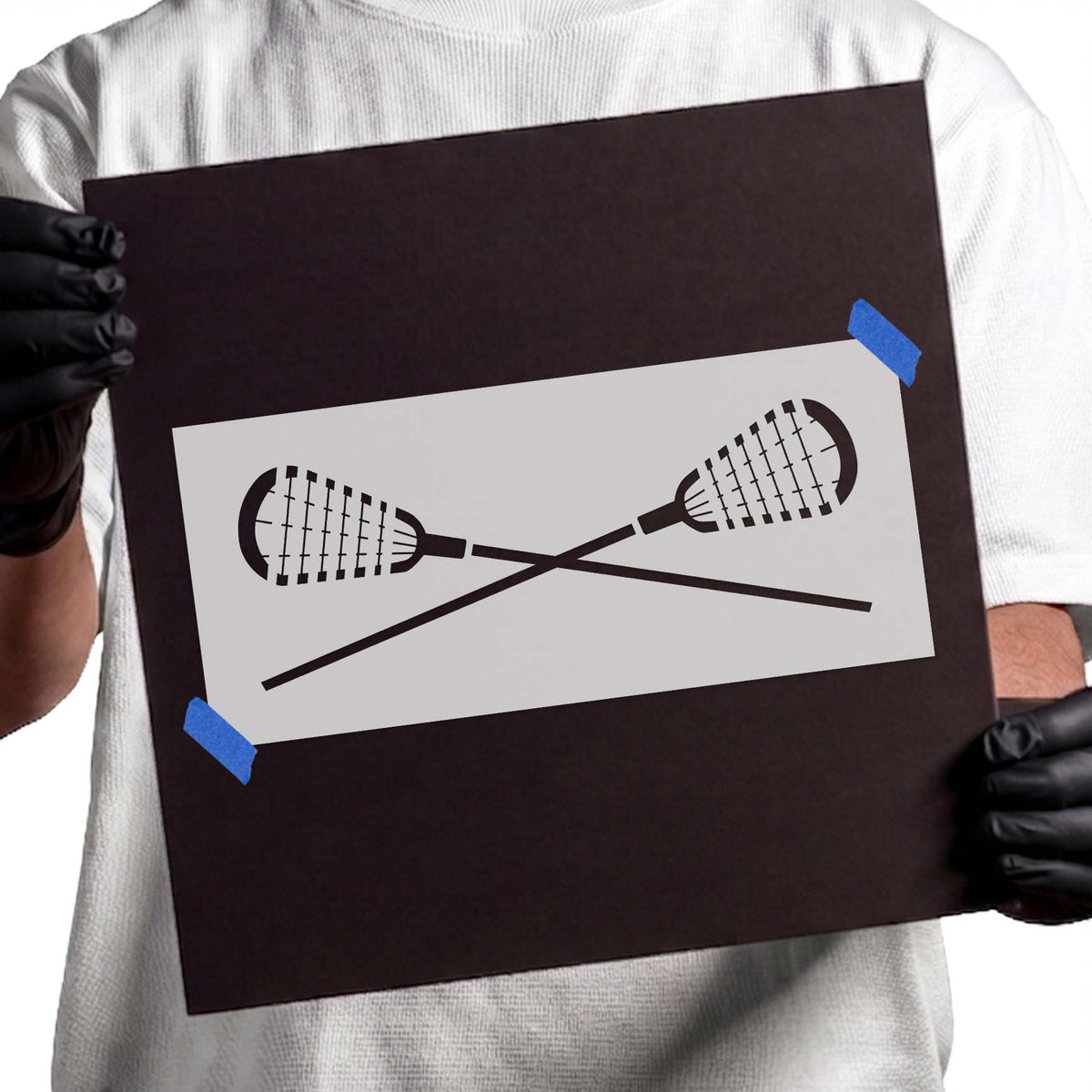 Lacrosse stencil featuring two crossed sticks with netted heads