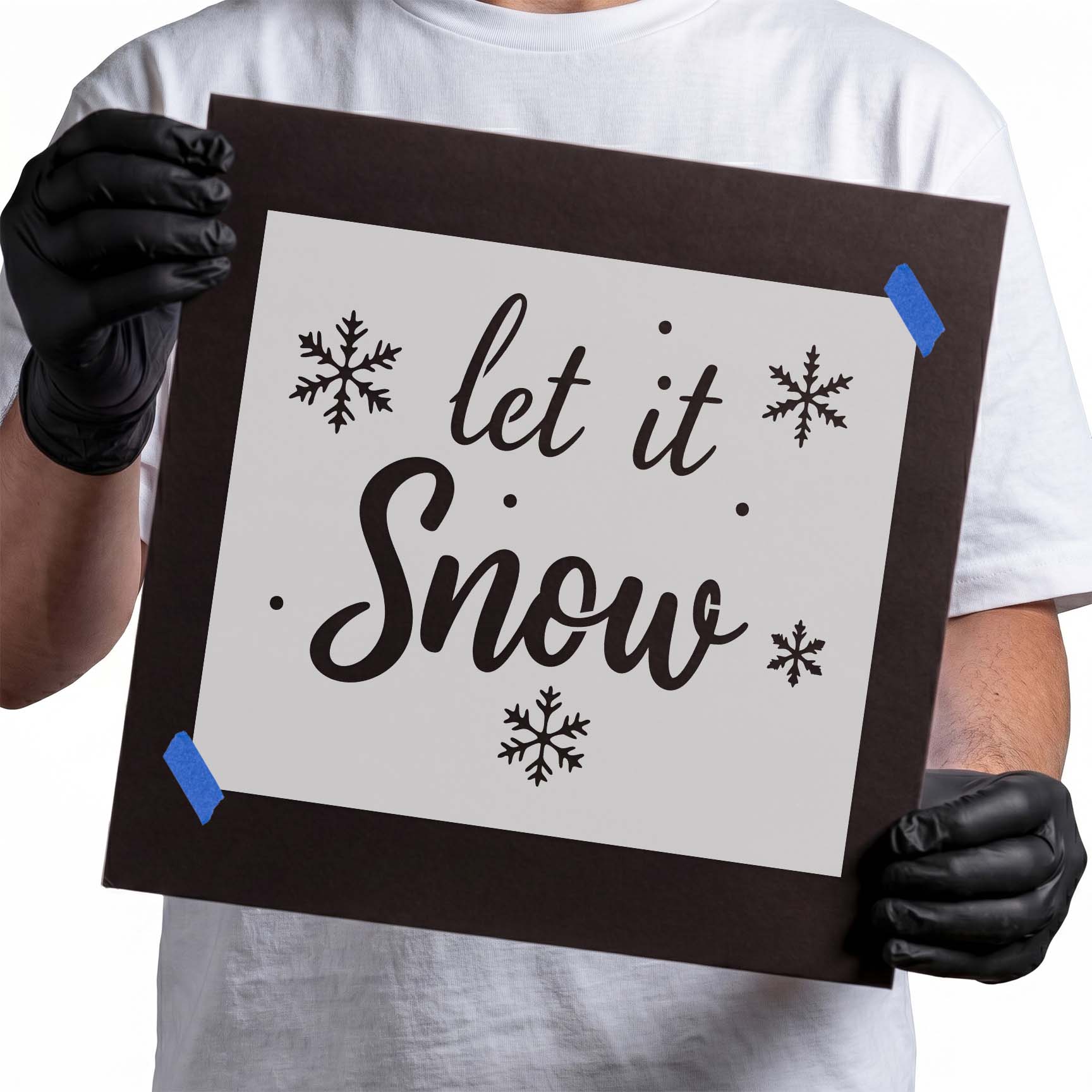 Let it snow lettering stencil surrounded by decorative snowflakes