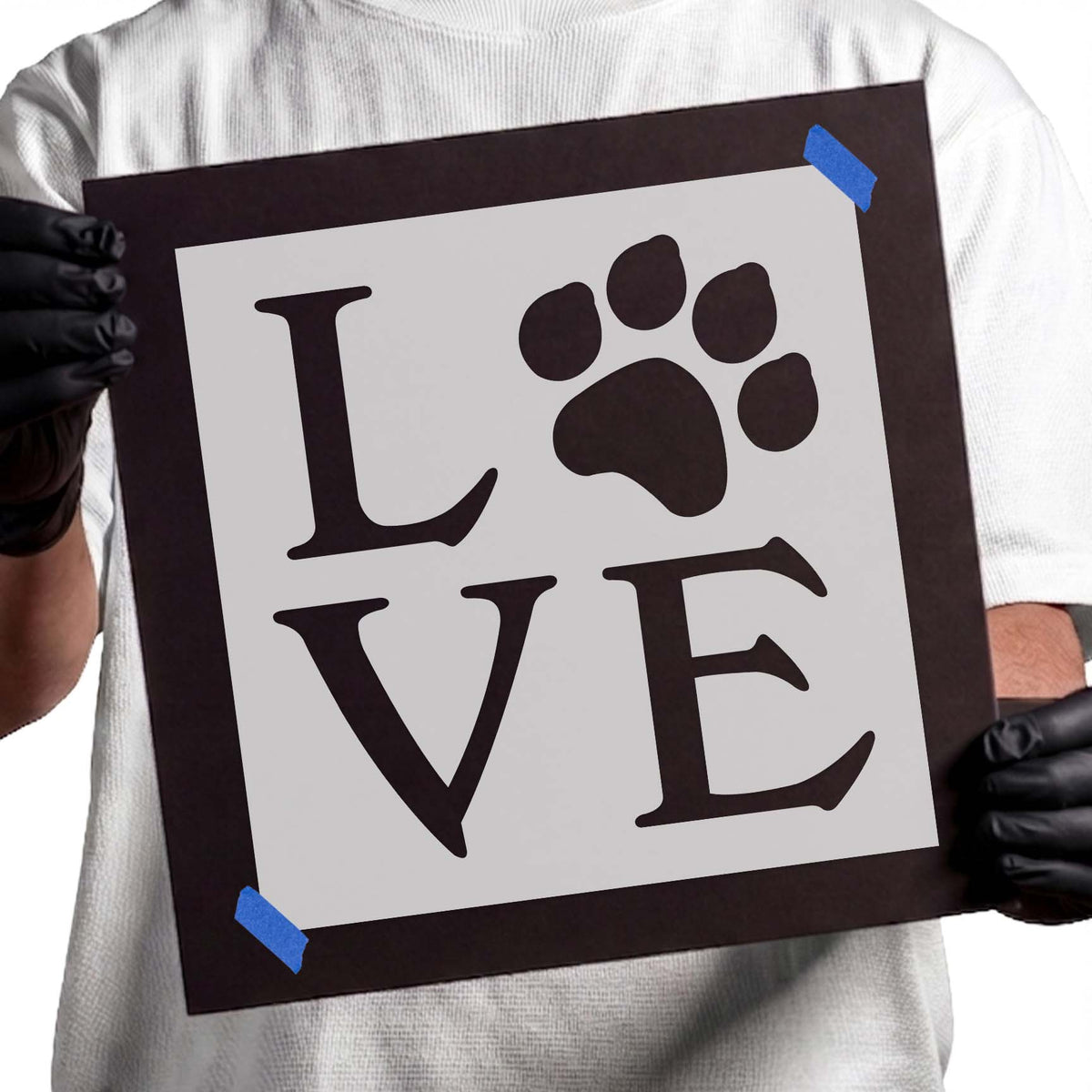 LOVE lettering stencil with a large paw print replacing the O