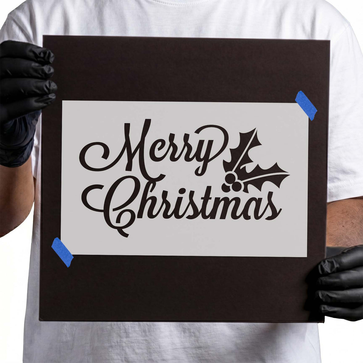 Merry Christmas script stencil with festive leaves and berry accents