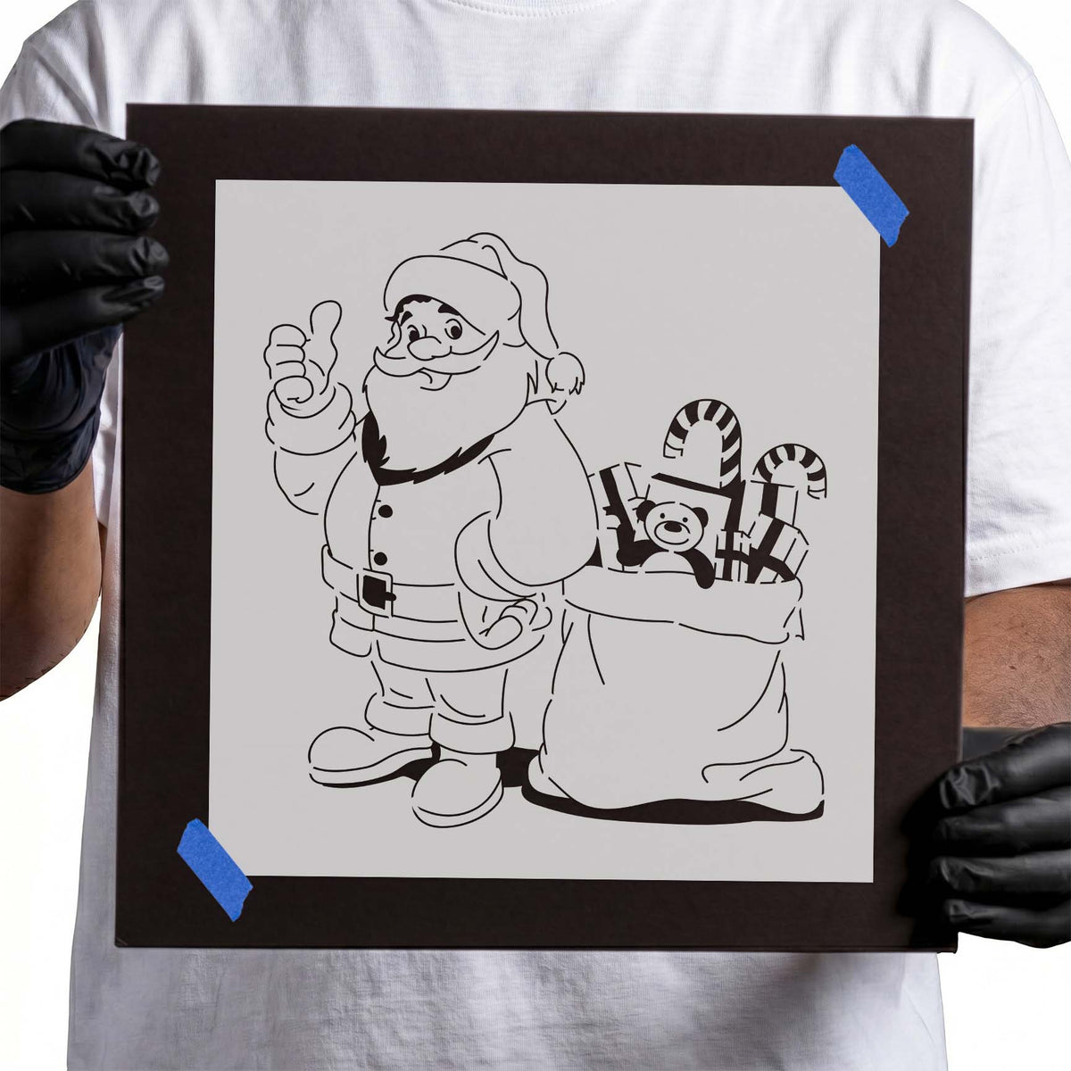 Santa Claus stencil with festive toy sack and Christmas gifts