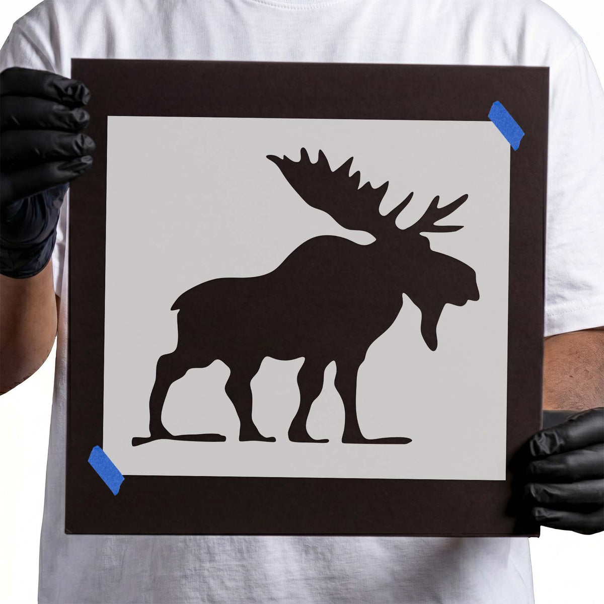 Standing moose stencil with broad antlers and bold side profile
