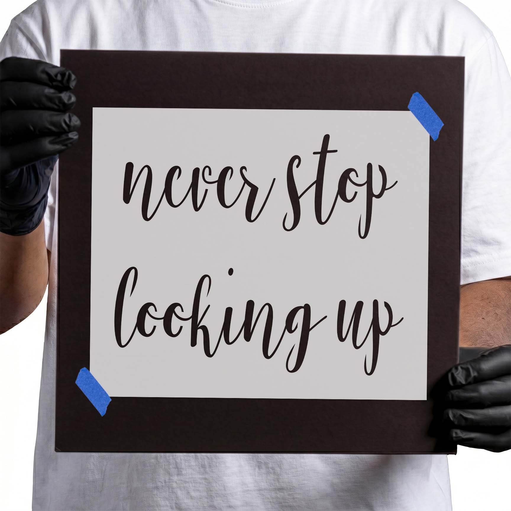 Never Stop Looking Up stencil with flowing script lettering