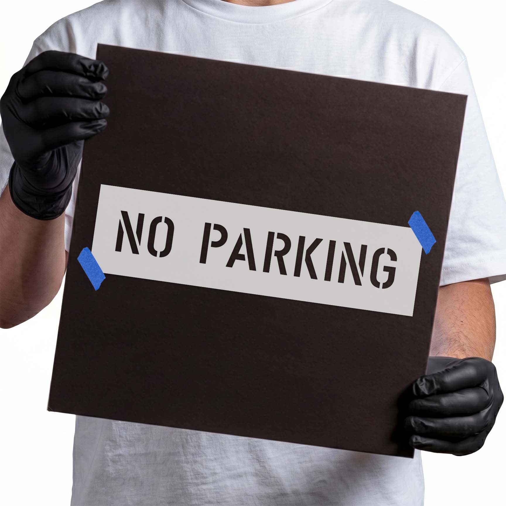 No parking stencil with tall uppercase lettering