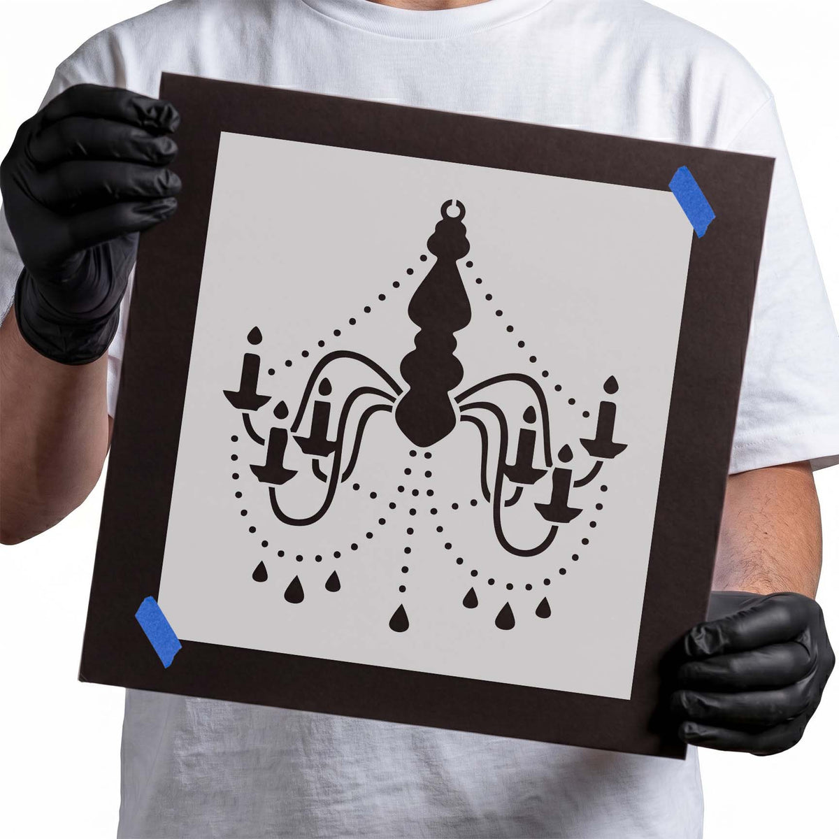 Ornate chandelier stencil with candle lights and hanging droplets