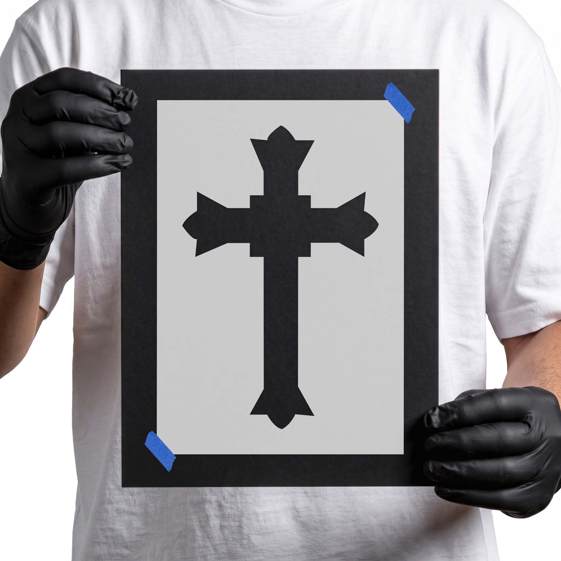 Ornate cross stencil with angular arms and pointed decorative ends