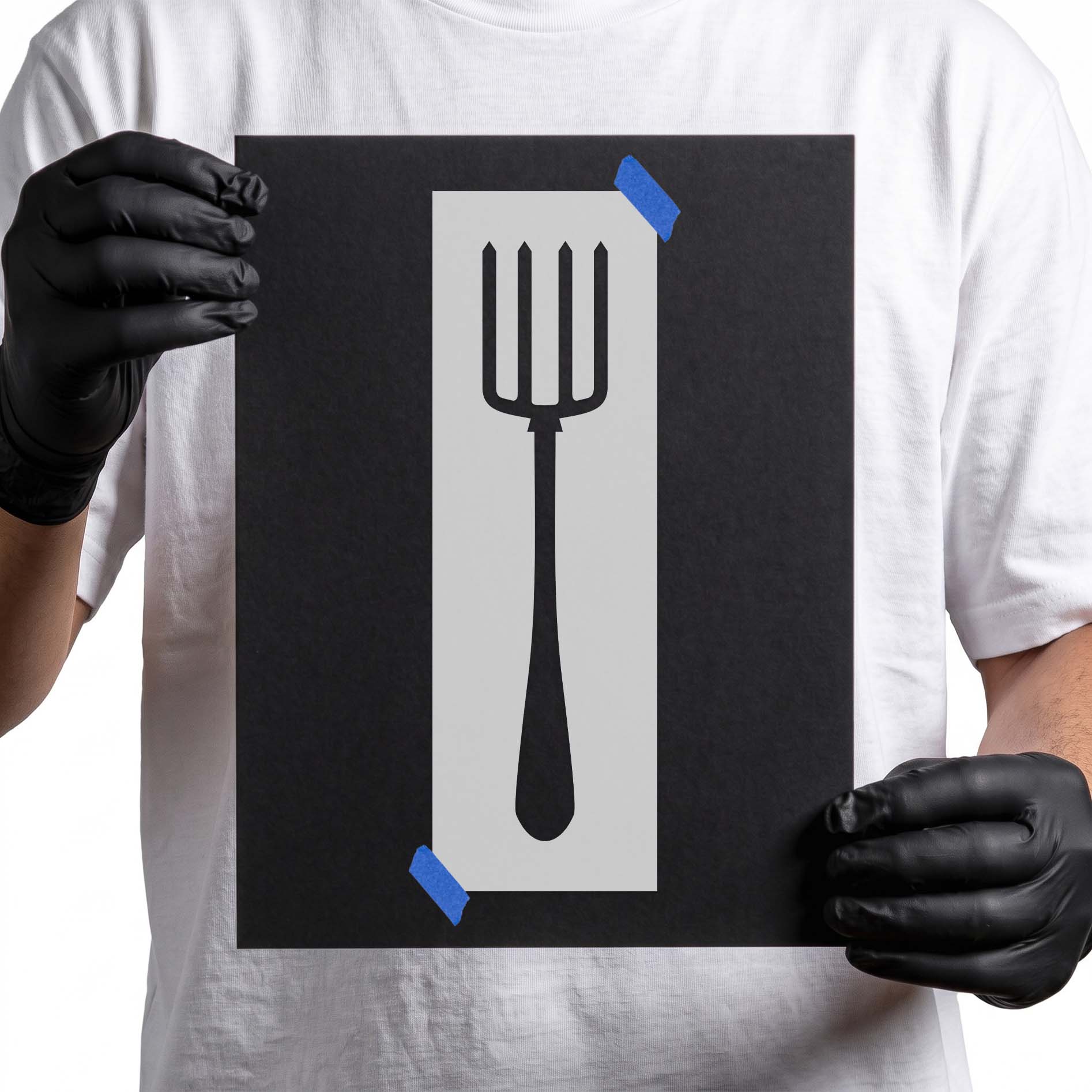 Four-tine pitchfork stencil with pointed tips and long handle