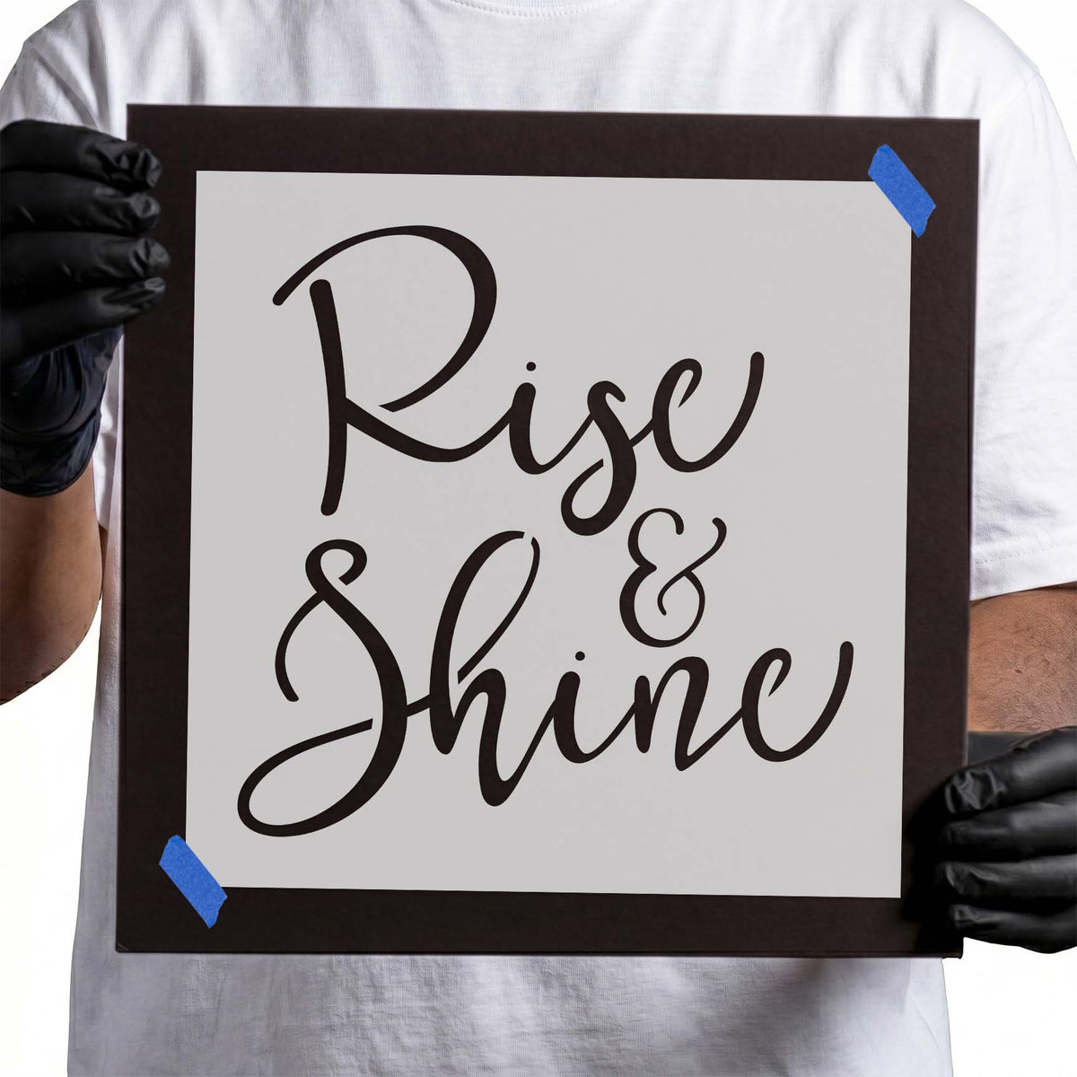 Rise and shine stencil displaying the uplifting phrase in large flowing script lettering