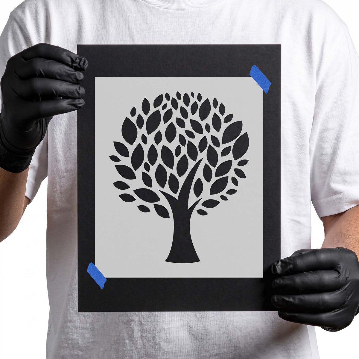 Round tree stencil with spreading branches and full leafy canopy