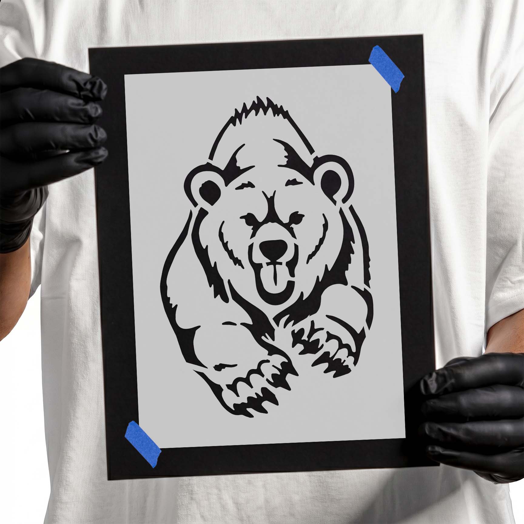 Front-facing running bear stencil with raised paws and detailed claws