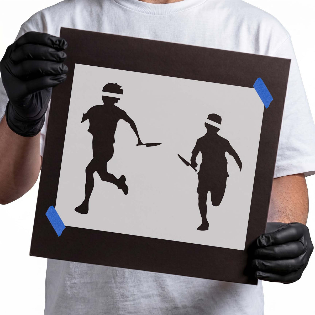 Running figures stencil showing two silhouettes carrying knives