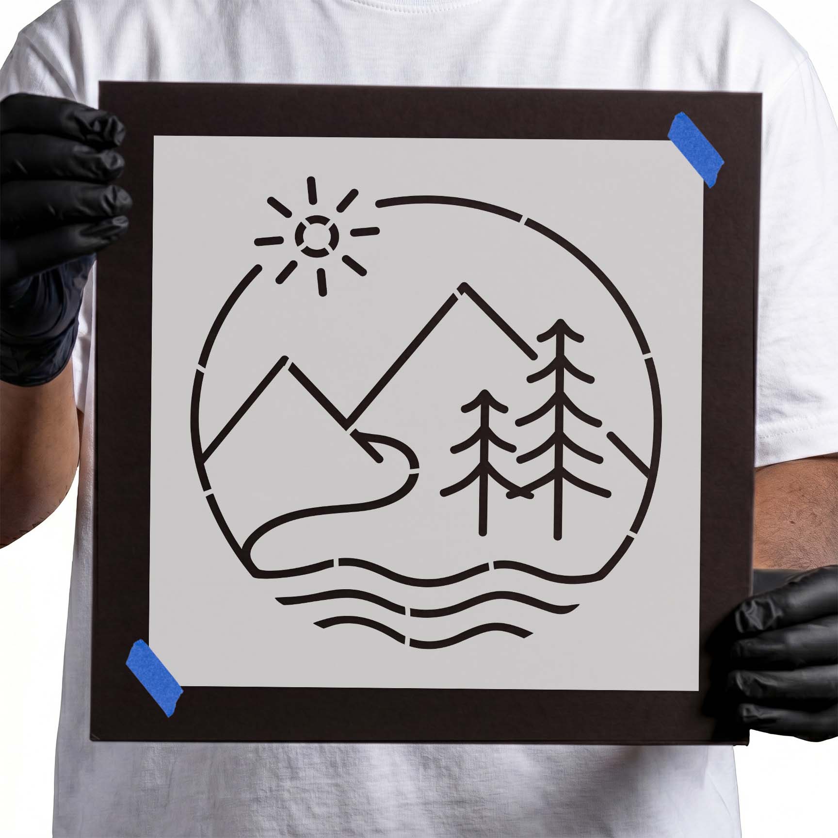 Mountain lake scene with pine trees sun and rippling water