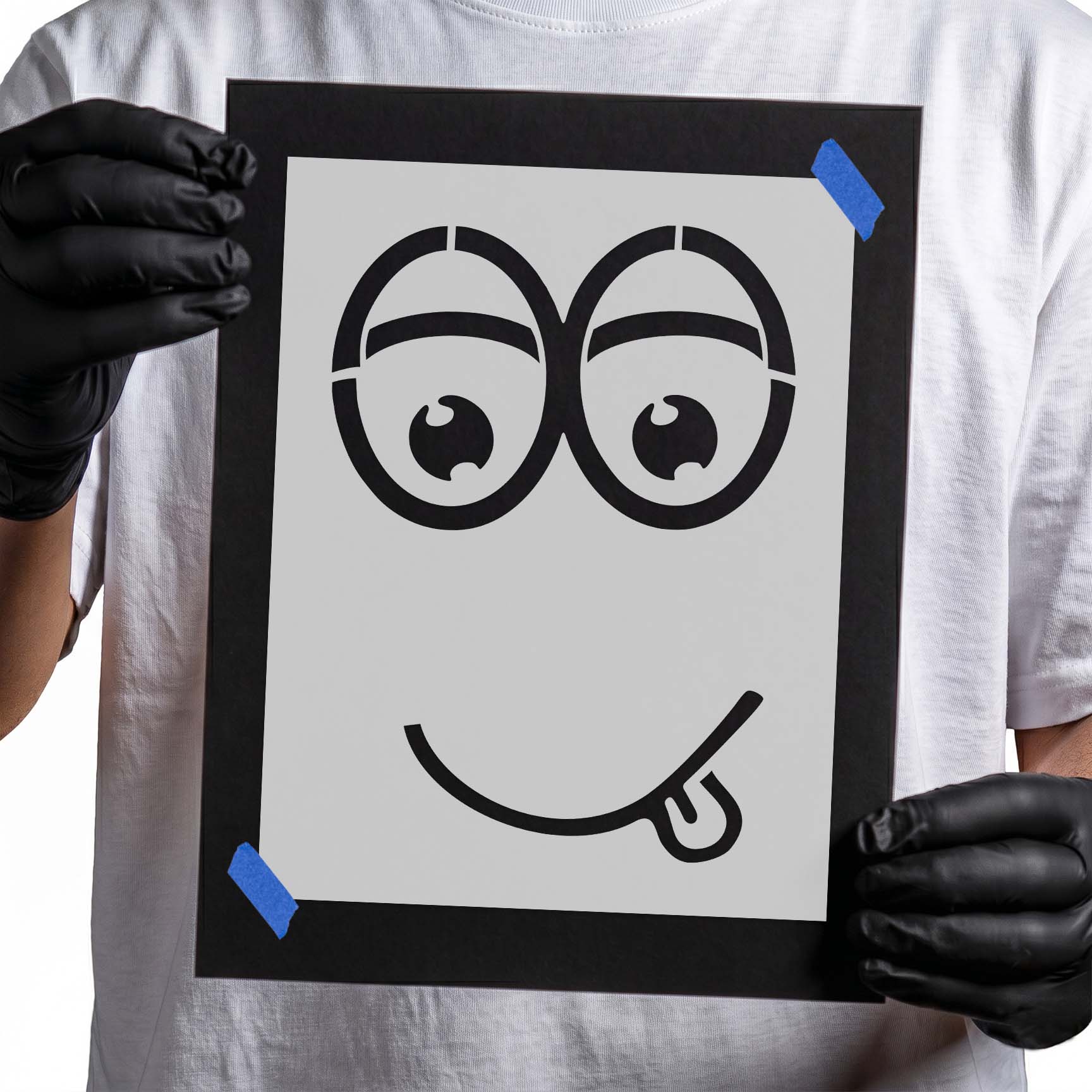 Goofy face stencil with oversized eyes and tongue sticking out