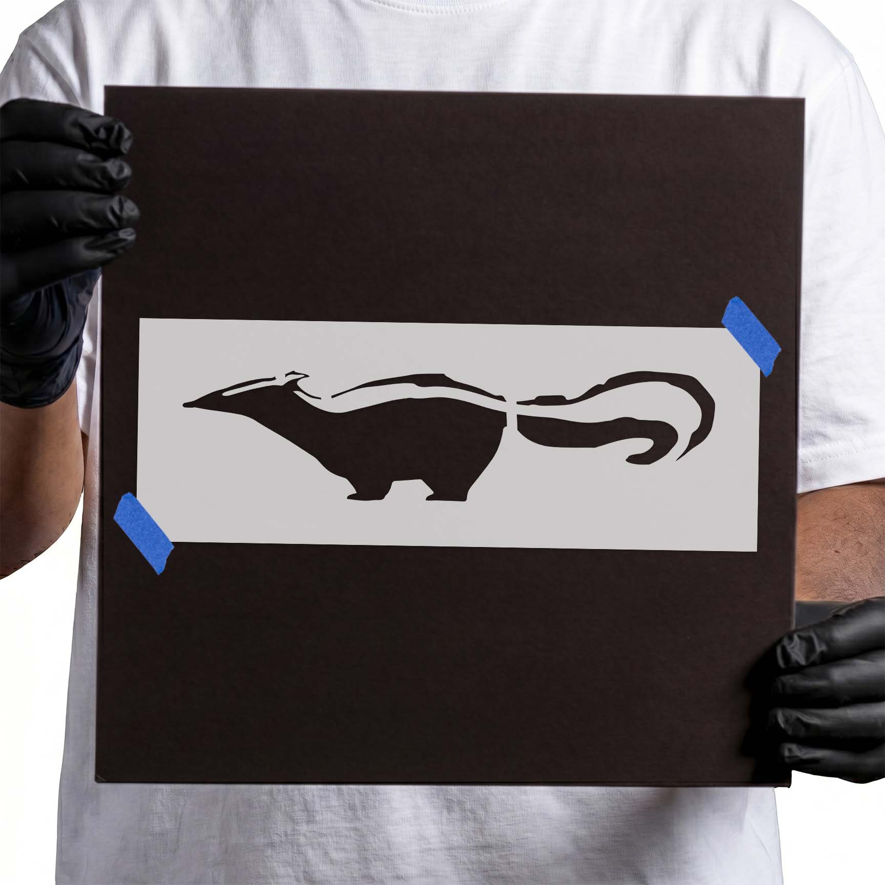Skunk silhouette stencil with striped back and long sweeping tail