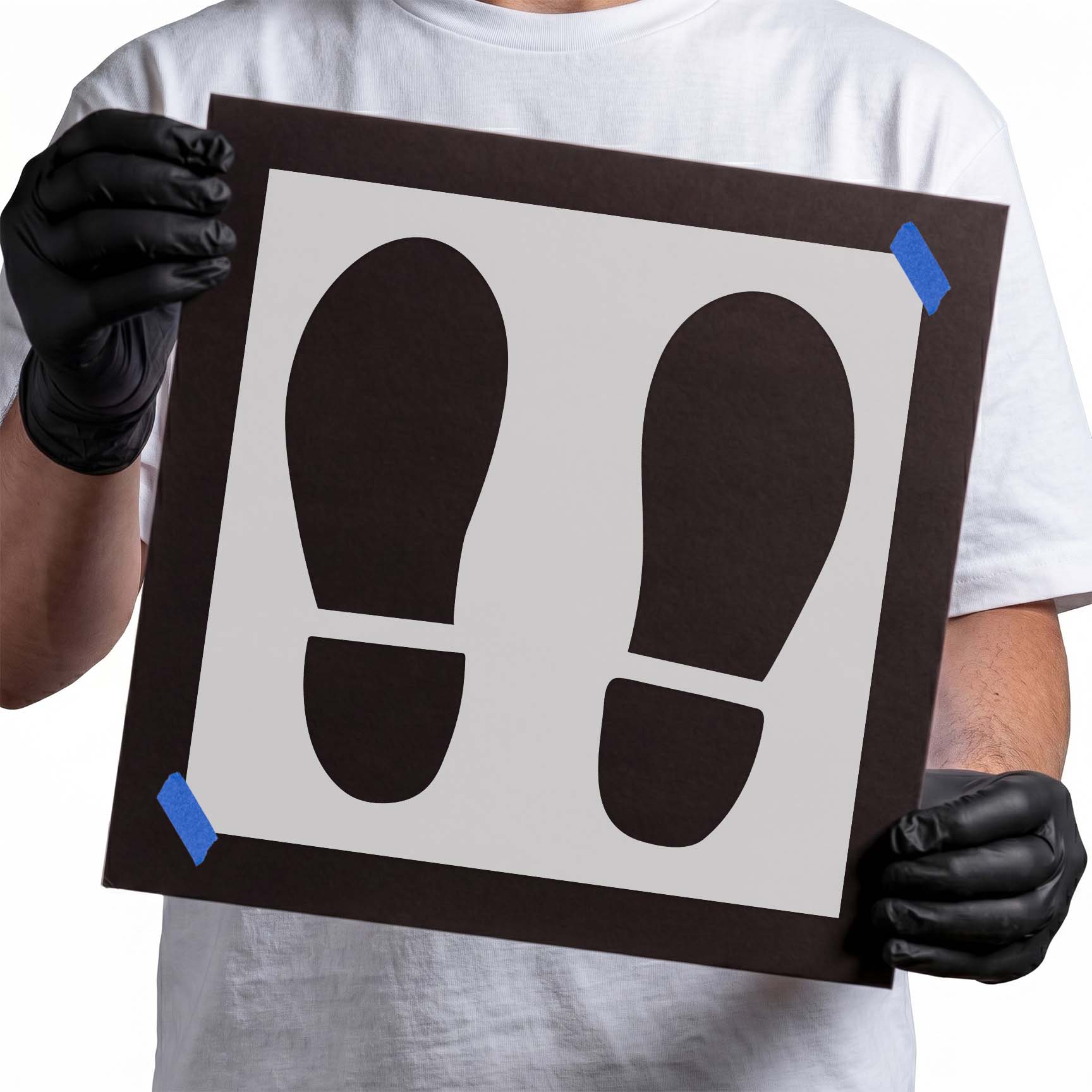 Pair of bold footprint stencil shapes for standing position markers