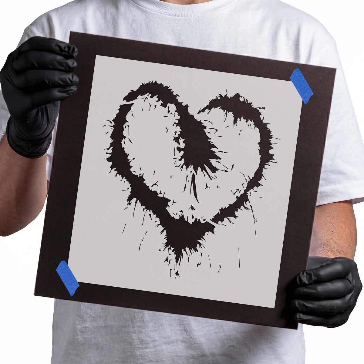 Sparkling heart stencil with expressive splatter-style edges