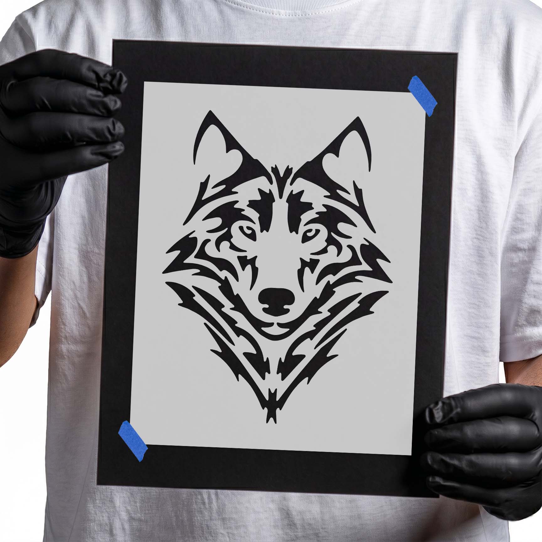 Wolf face stencil with pointed ears and angular fur markings