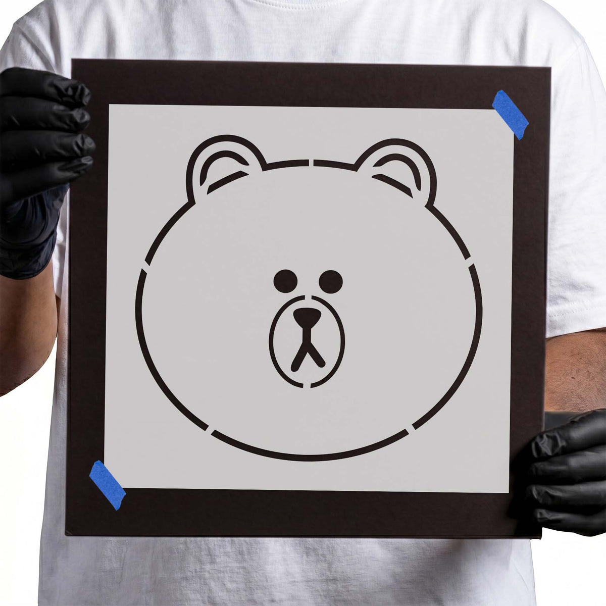 Teddy bear stencil with rounded ears and simple facial features