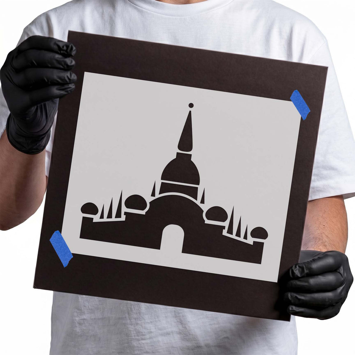 Temple stencil with symmetrical domes, pointed spires and central tower