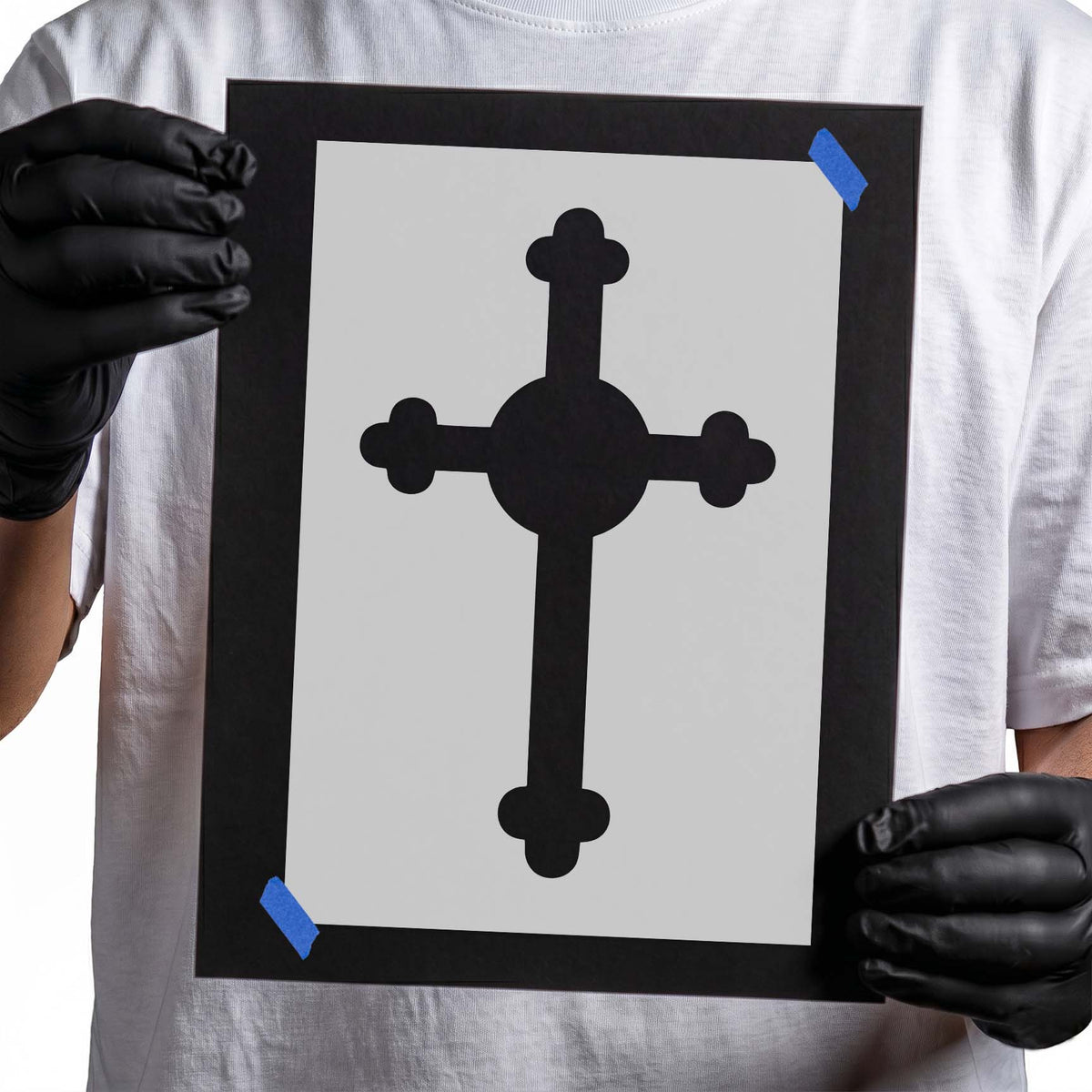 Trefoil cross stencil featuring rounded clover-shaped ends and a bold circular center