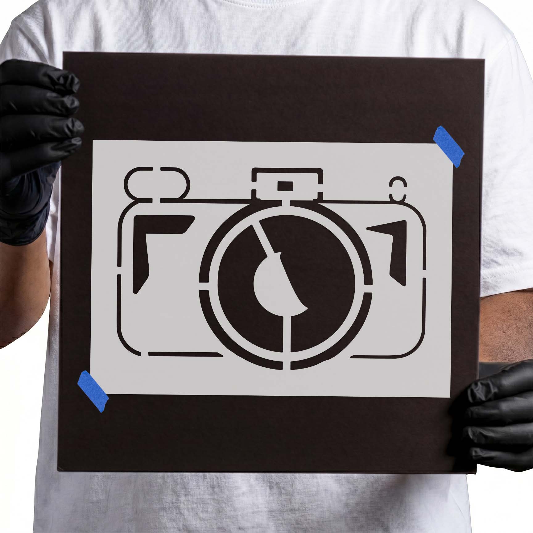 Vintage camera stencil with large circular lens and retro details