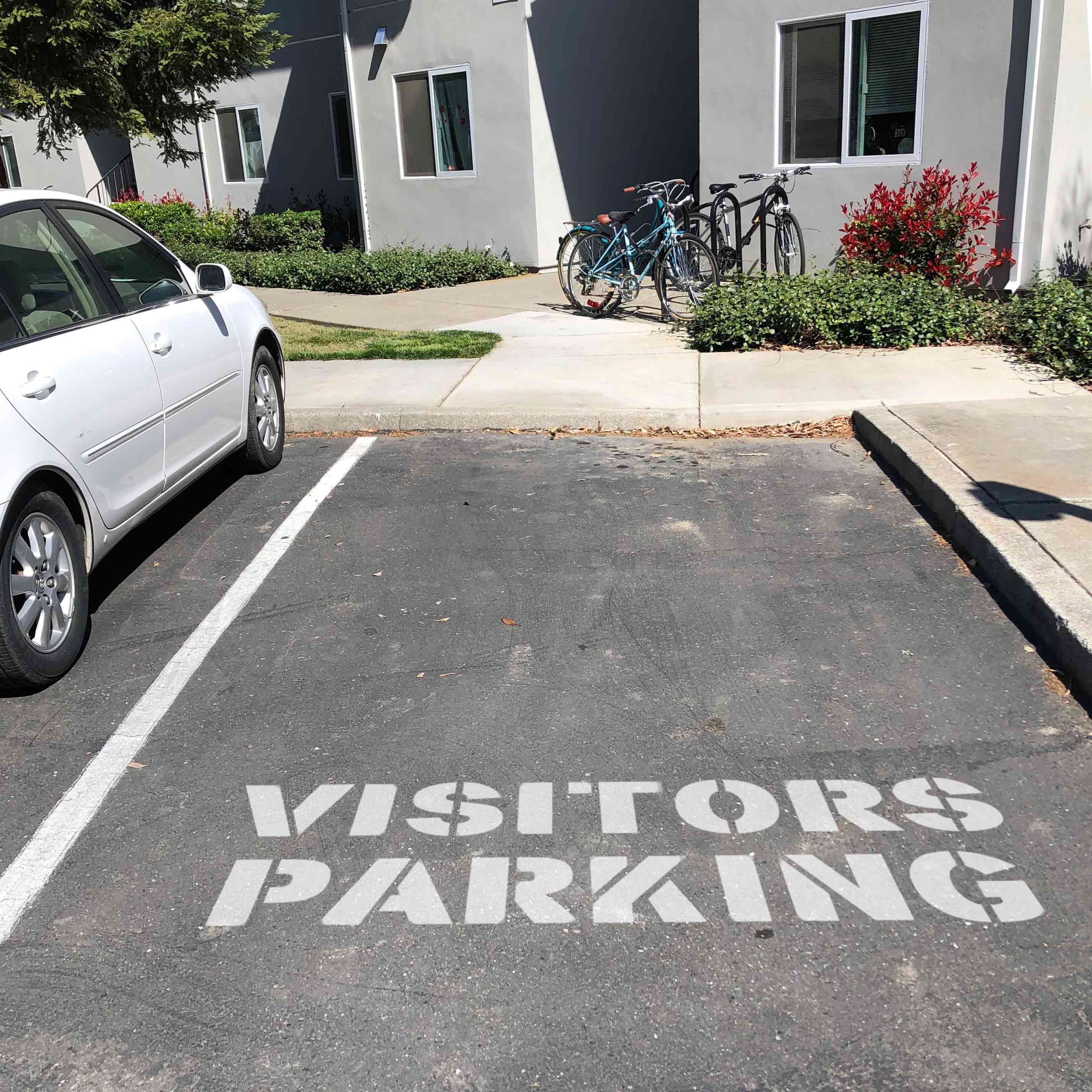 Large Stencil Painted on Parking Space