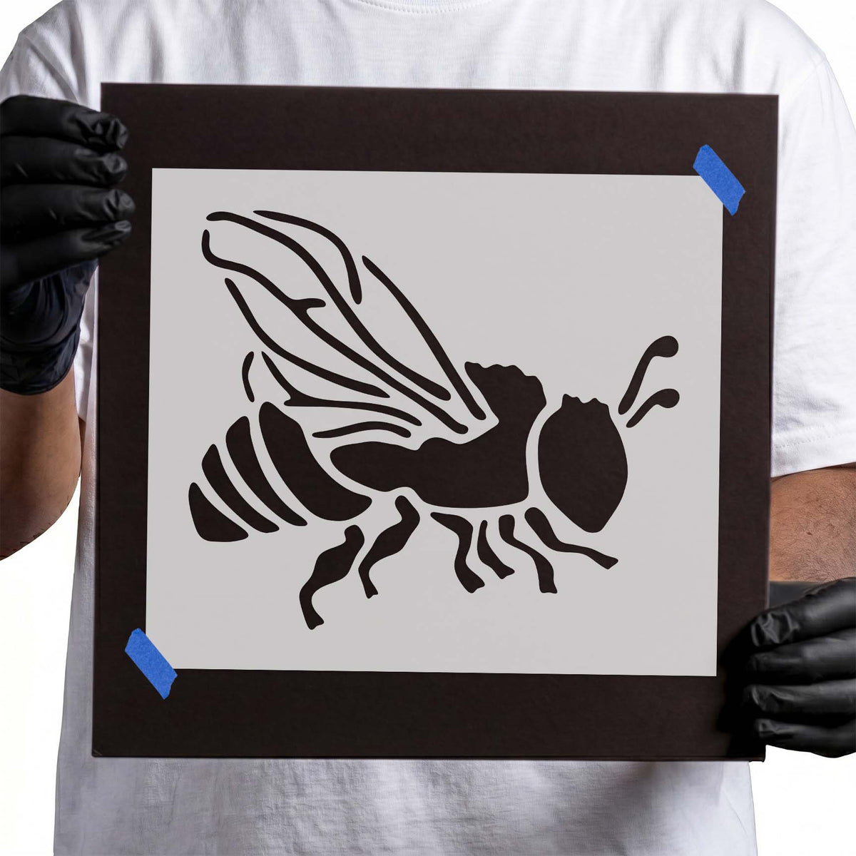 Walking bee stencil with striped body, spread wings and antennae