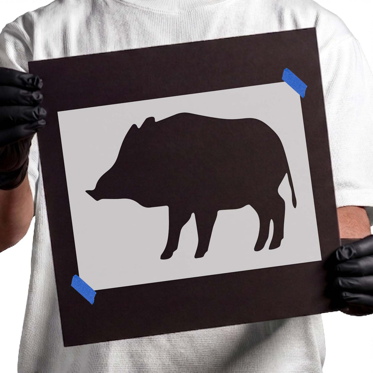 Warthog stencil showing a solid side profile animal silhouette