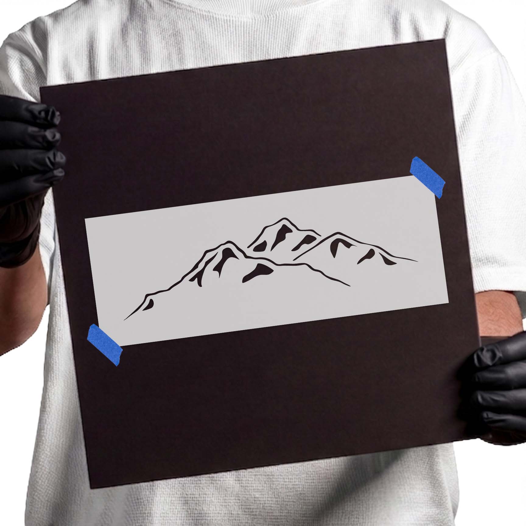 Wide mountain range stencil with layered peaks and rocky accents