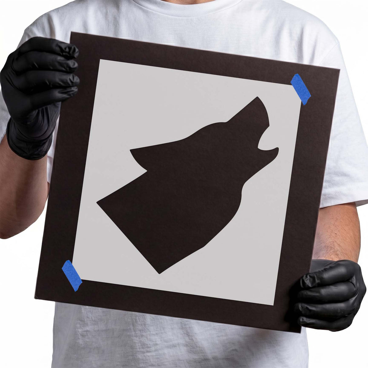 Wolf head stencil with raised muzzle and angular silhouette
