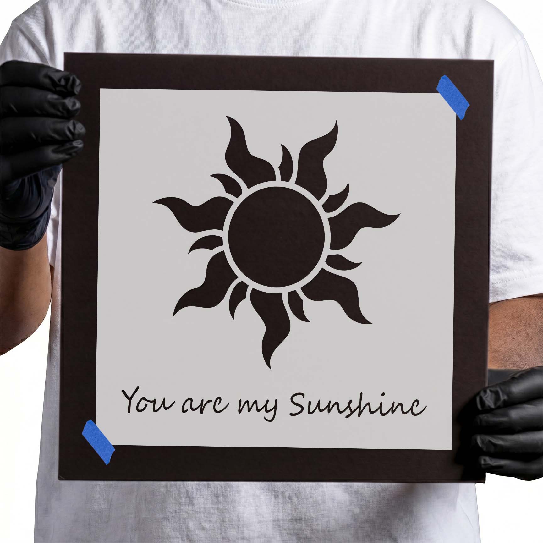 Sun stencil with flowing rays and You are my Sunshine lettering