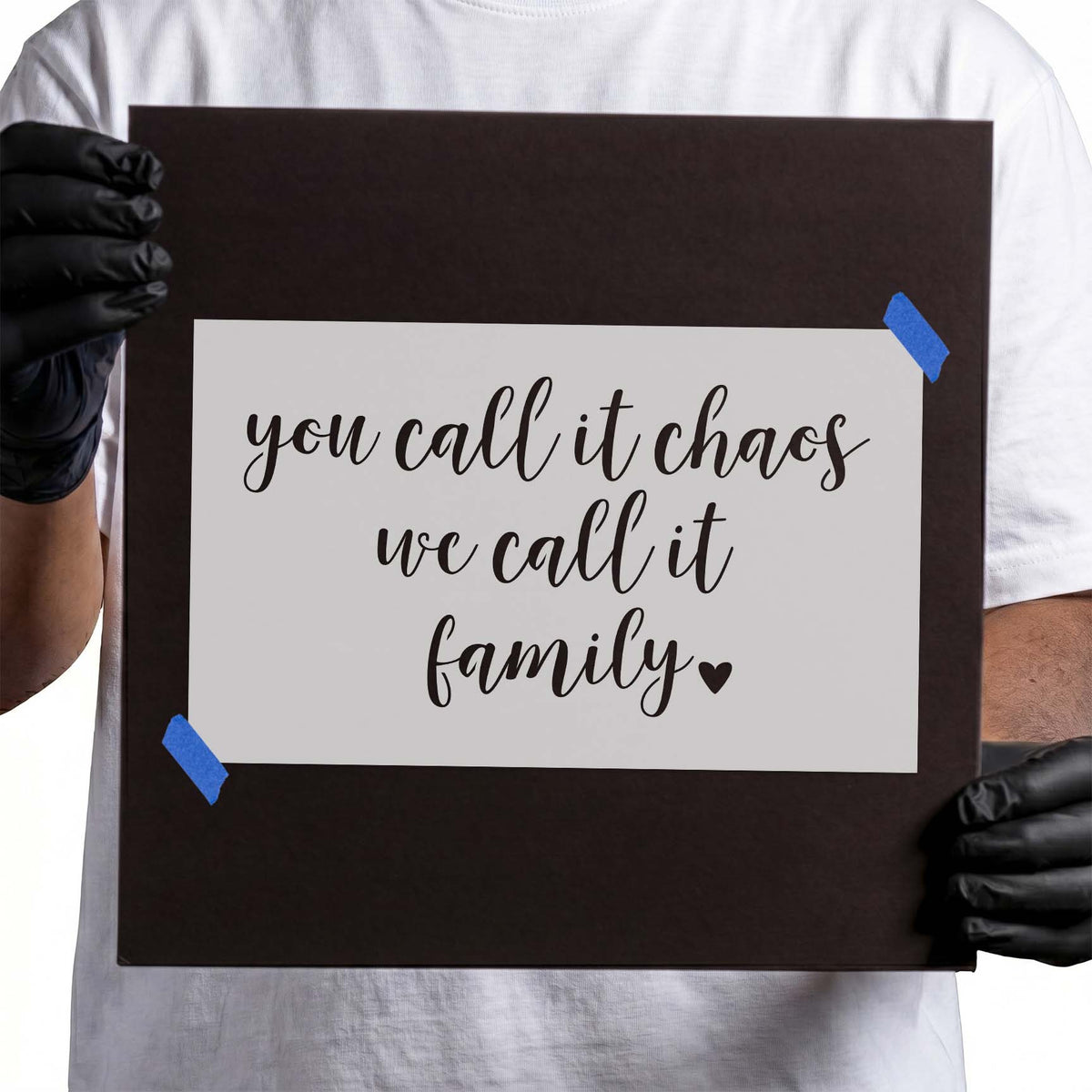 Family quote stencil with flowing script lettering and small heart